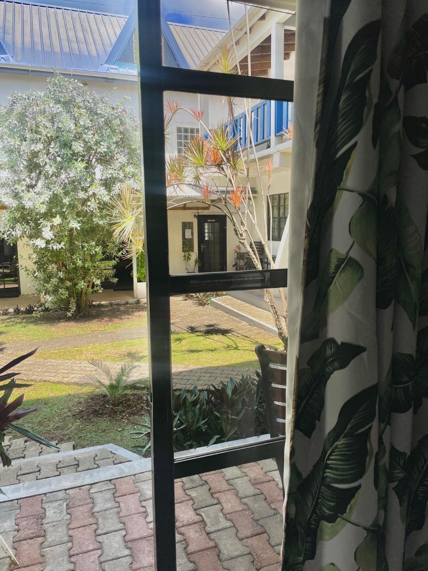 Bananaquit Tobago -Stay Near The Beach Crown Point Exterior photo